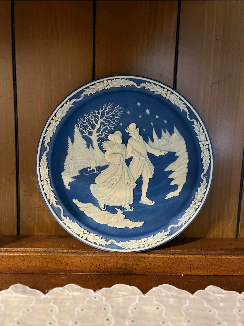 Blue and White Ceramic Wall Plate with Winter Skating Scene